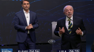 Flávio Bolsonaro (PL) e Lula (PT) durante debate na Band — Foto: Reprodução de vídeo