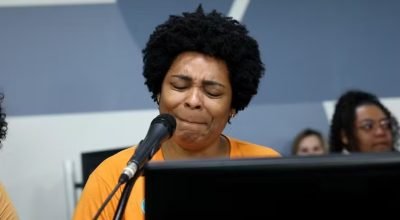 Liliane França da Silva, viúva do gari Laudemir Fernandes, morto em Belo Horizonte — Foto: Re...